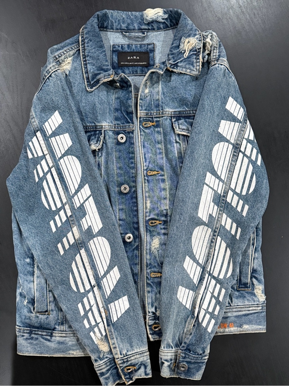 Zara Blue Distressed Denim Jacket with White Sleeve Graphics